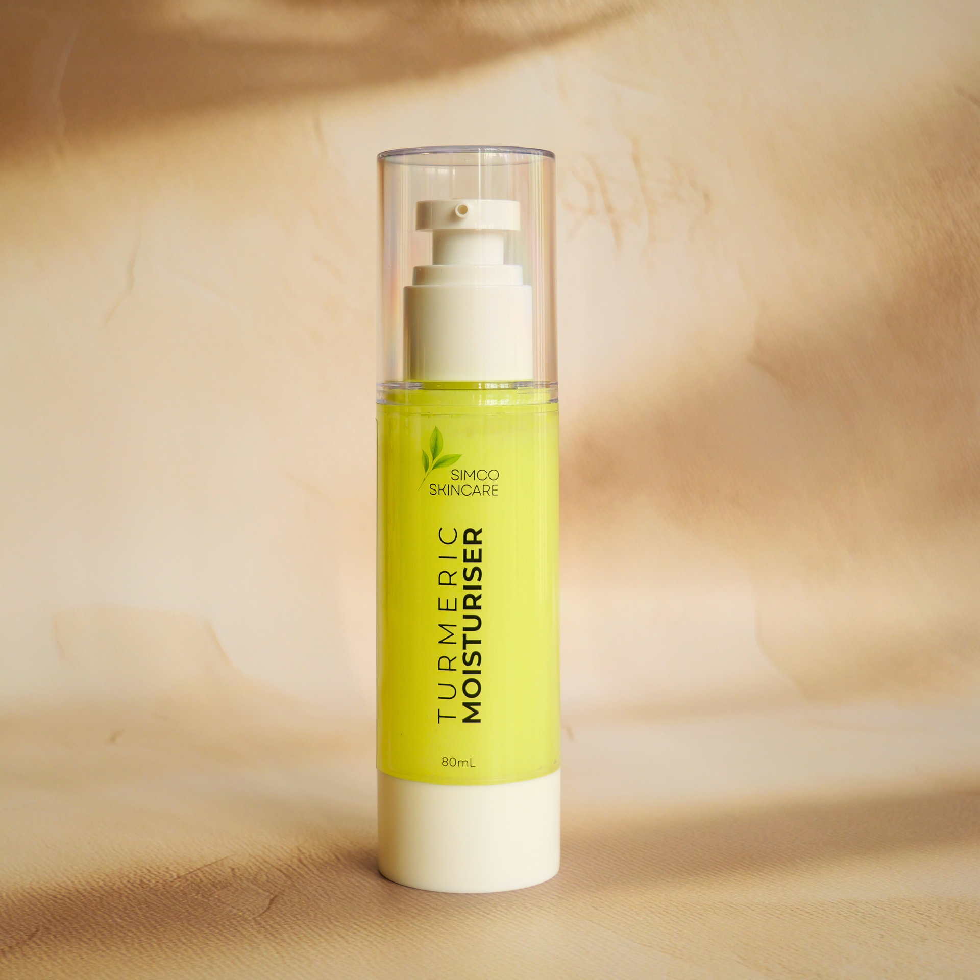 Turmeric Moisturiser on a beige background