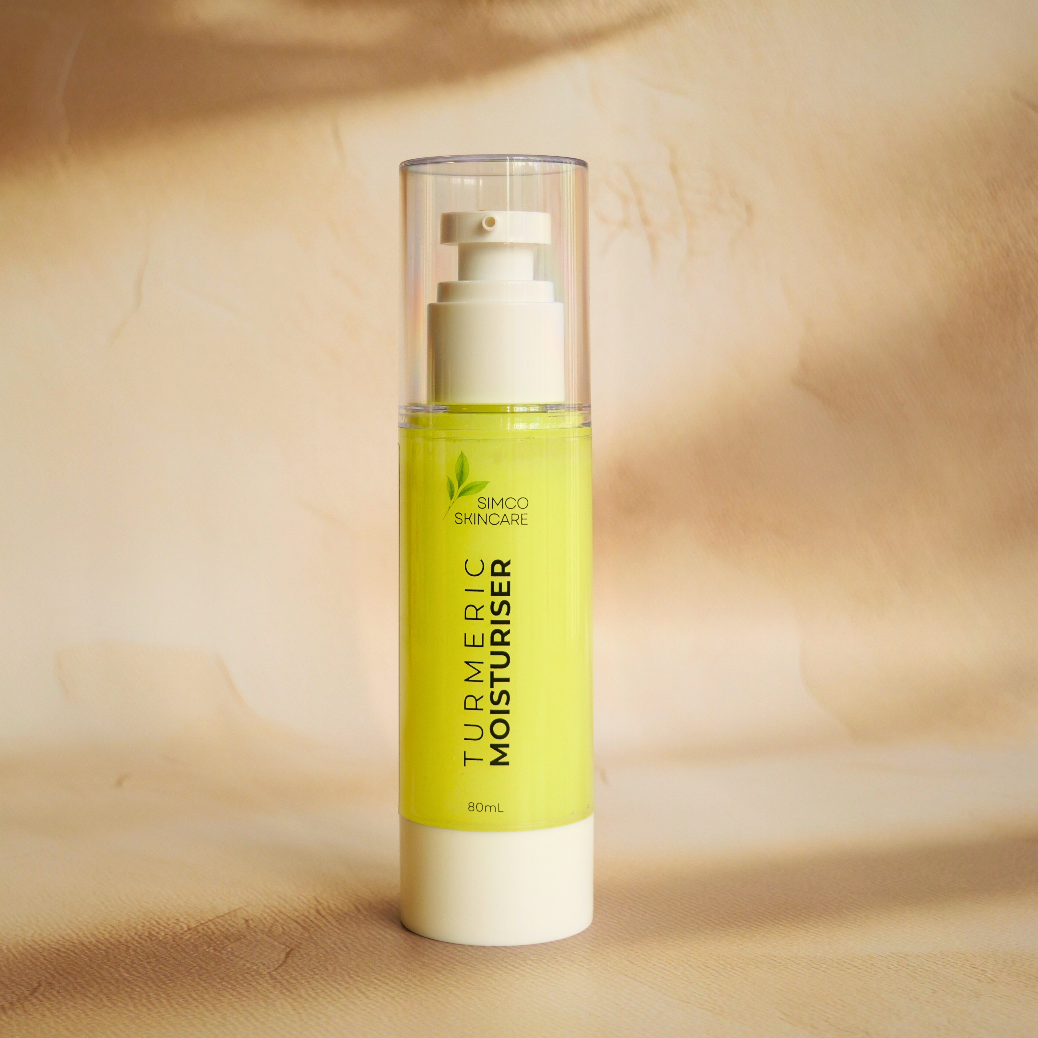 Turmeric Moisturiser on a beige background